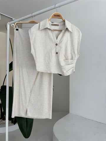 bluzu-buzgulu-ve-etegi-tokali-keten-ta-183df5