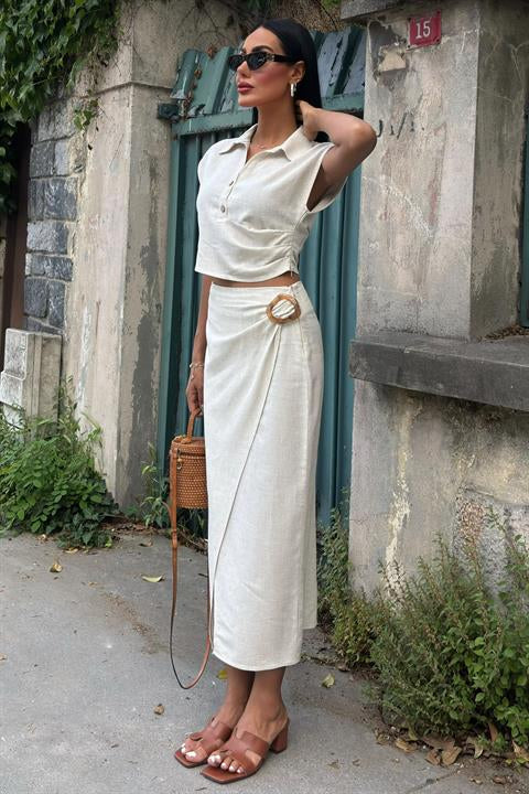 bluzu-buzgulu-ve-etegi-tokali-keten-ta-f965c5